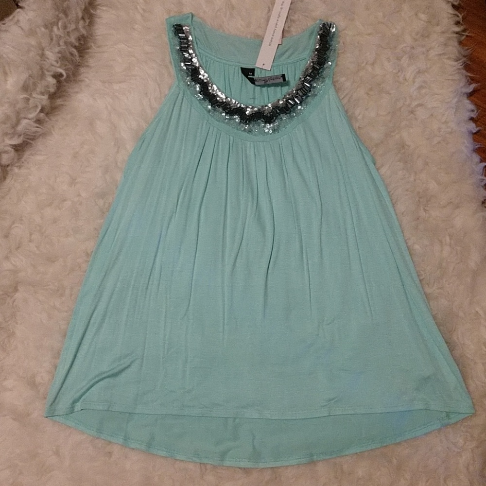 Ellumination brand new with tags, very classy,